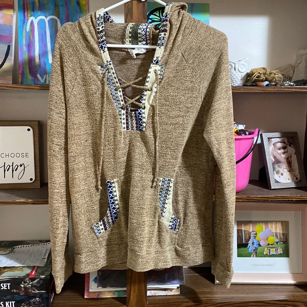 Skönhet womens pull over/lace up jacket. Tan with tribal print design. Size L